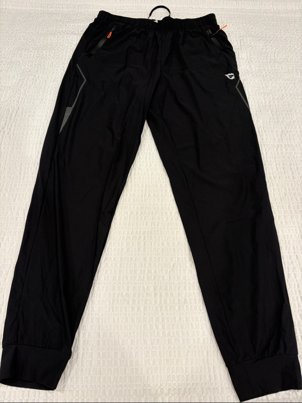 Baleaf Women’s Black Athletic Jogger Pants with Reflective Trim
Size M